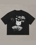 Washed black heavyweight tee with a black and white photo print of cats holding cash outside a fish taco stand at night