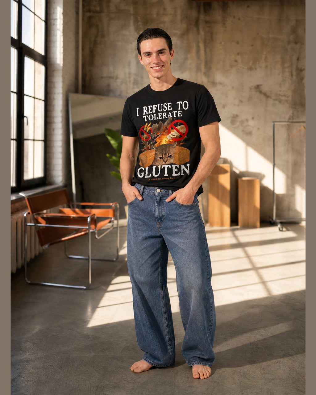 Man wearing the I REFUSE TO TOLERATE GLUTEN heavyweight boxy tee in Black
