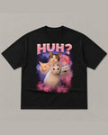 Black heavyweight tee reading HUH? in pink chrome lettering above four cats in a pink and purple space nebula