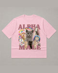 Pink heavyweight tee reading ALPHA MALE in glitter lettering around a collage of kittens, a puppy and a unicorn with rainbows