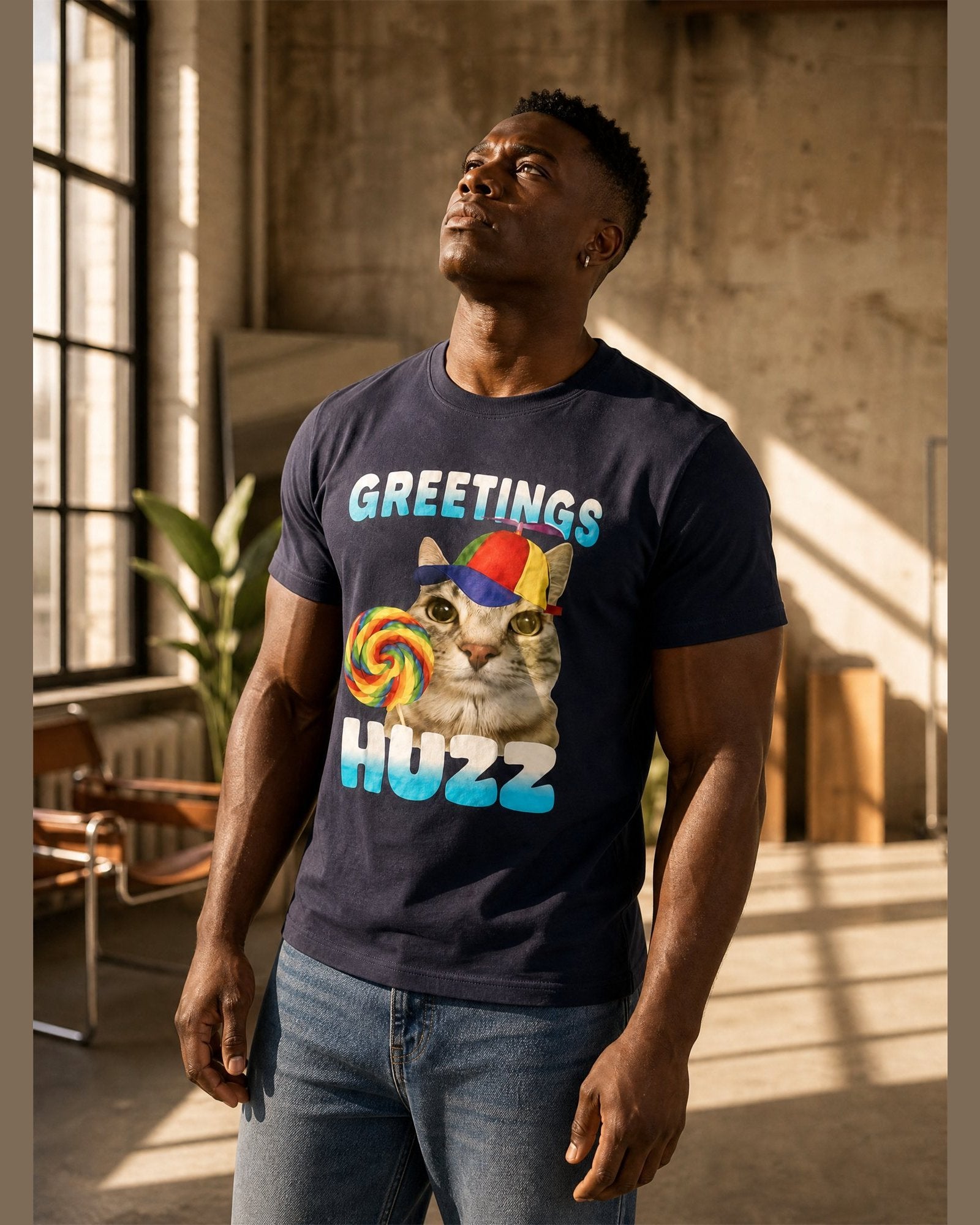 Man wearing the GREETINGS HUZZ heavyweight boxy tee in Navy