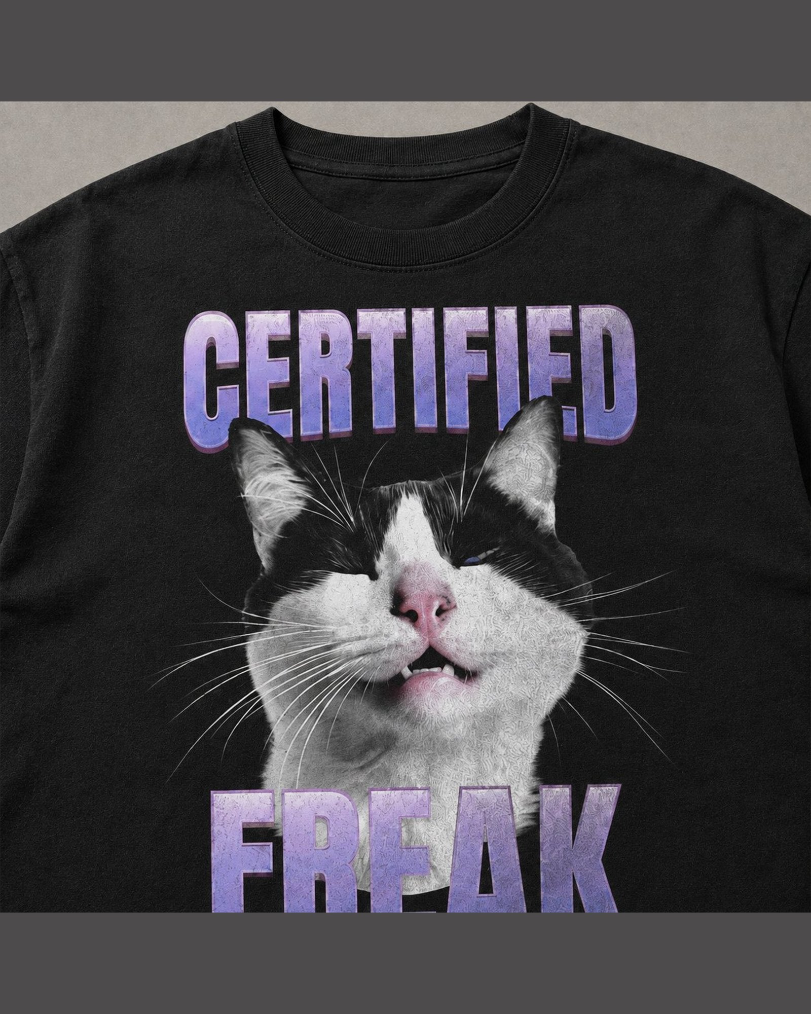 Close-up of the screen printed CERTIFIED FREAK graphic on heavyweight cotton