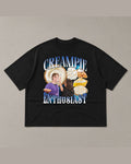 Black heavyweight tee reading CREAMPIE ENTHUSIAST in blue chrome bootleg lettering around photos of cream pies