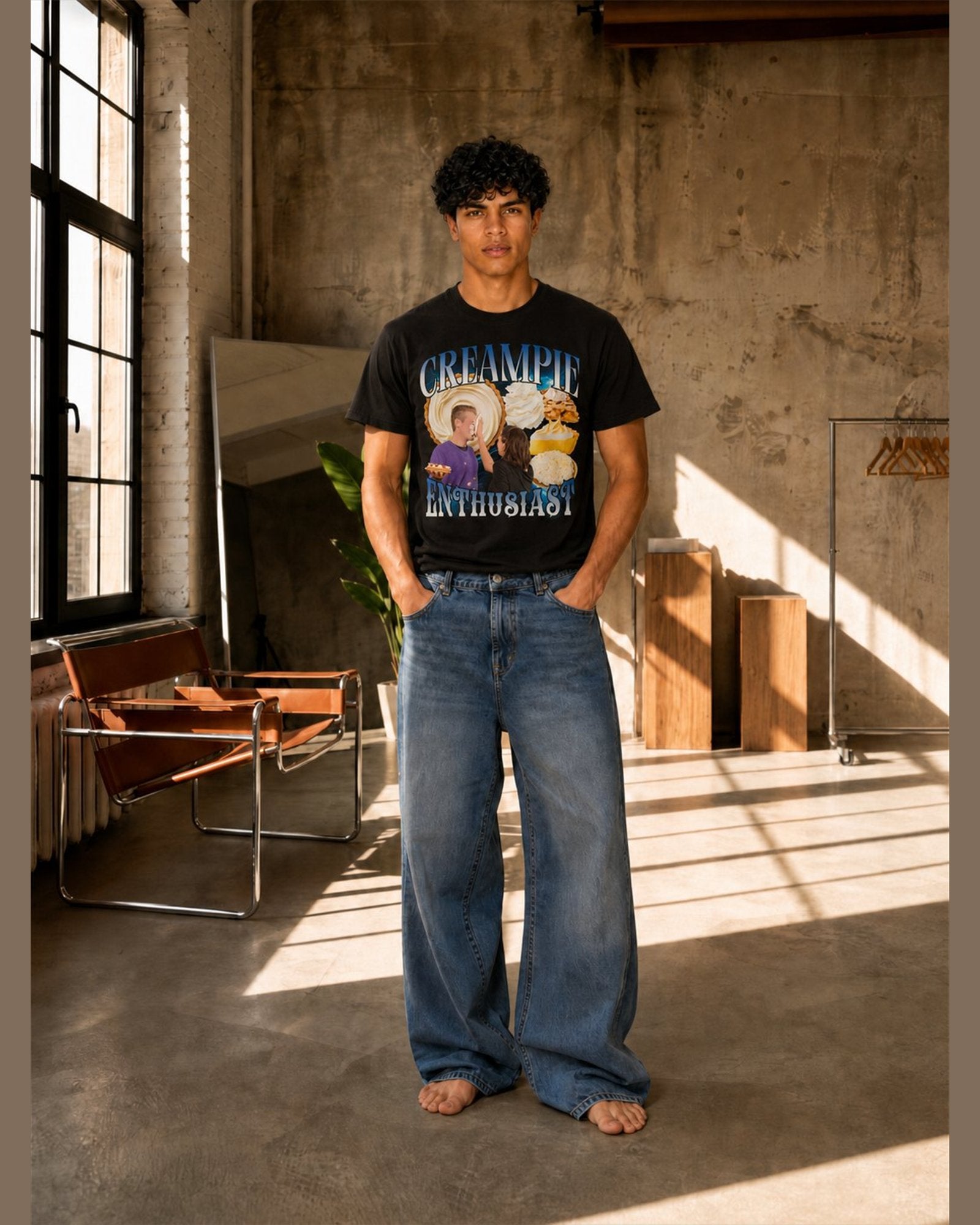 Man wearing the CREAMPIE ENTHUSIAST heavyweight boxy tee in Black