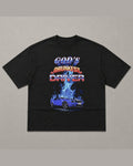 Black heavyweight tee reading GOD'S DRUNKEST DRIVER in chrome and flame lettering above a blue muscle car surrounded by blue fire