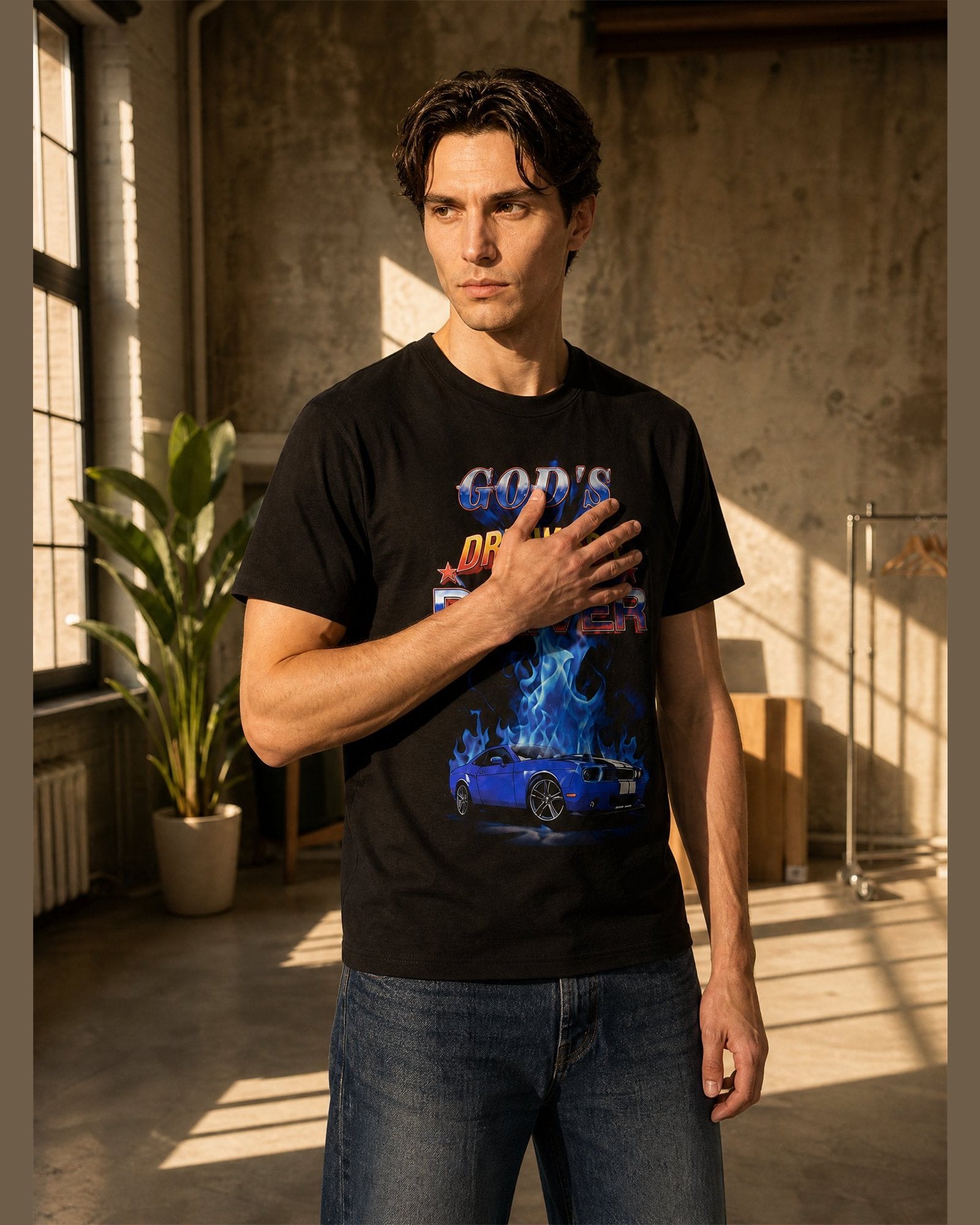 Man wearing the GOD'S DRUNKEST DRIVER heavyweight boxy tee in Black