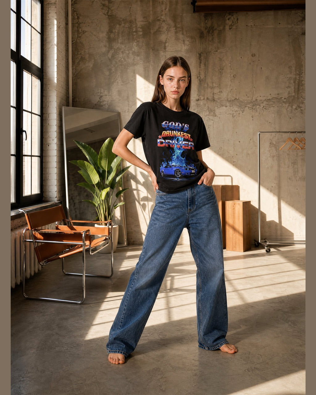 Woman wearing the GOD'S DRUNKEST DRIVER heavyweight boxy tee in Black