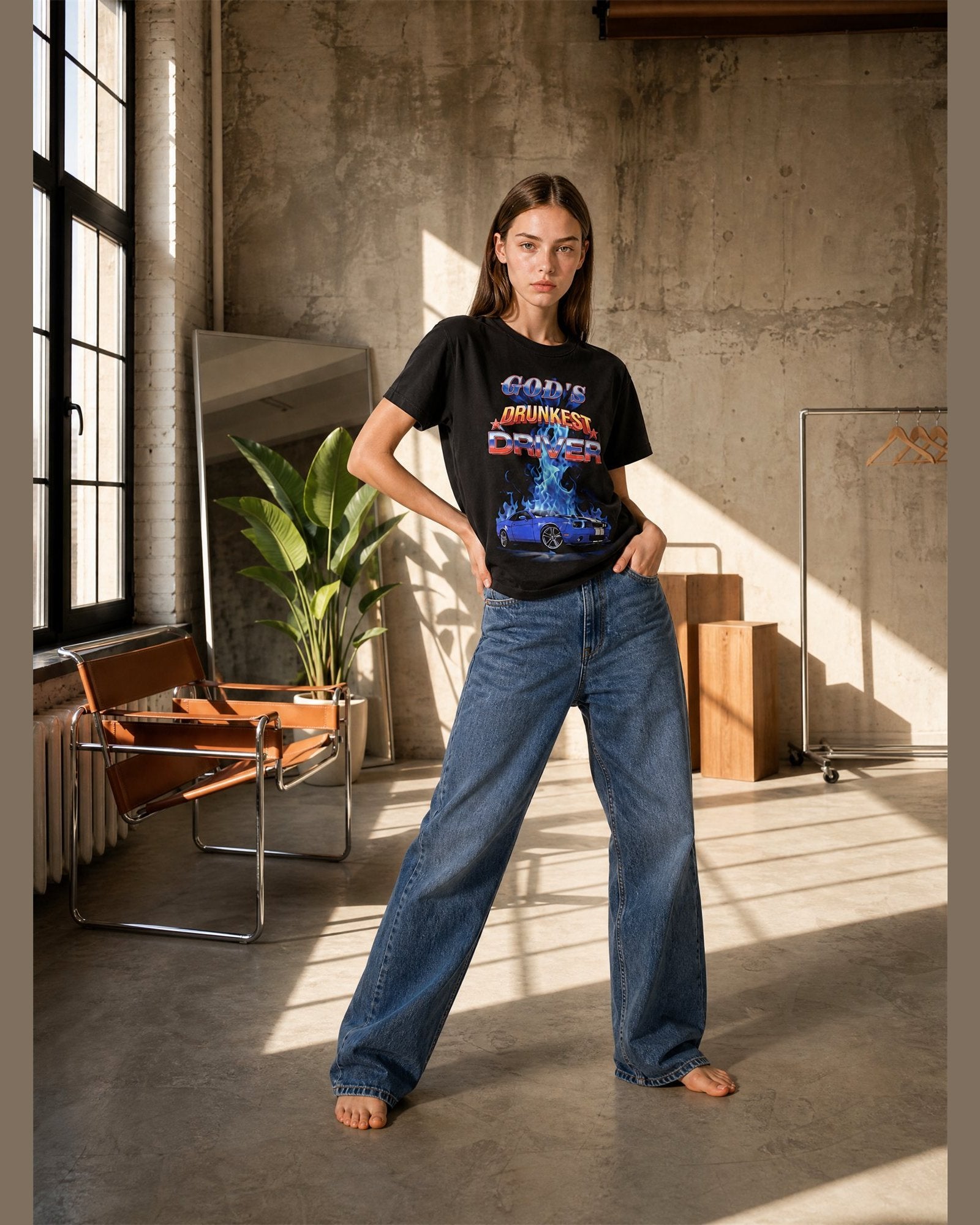 Woman wearing the GOD'S DRUNKEST DRIVER heavyweight boxy tee in Black