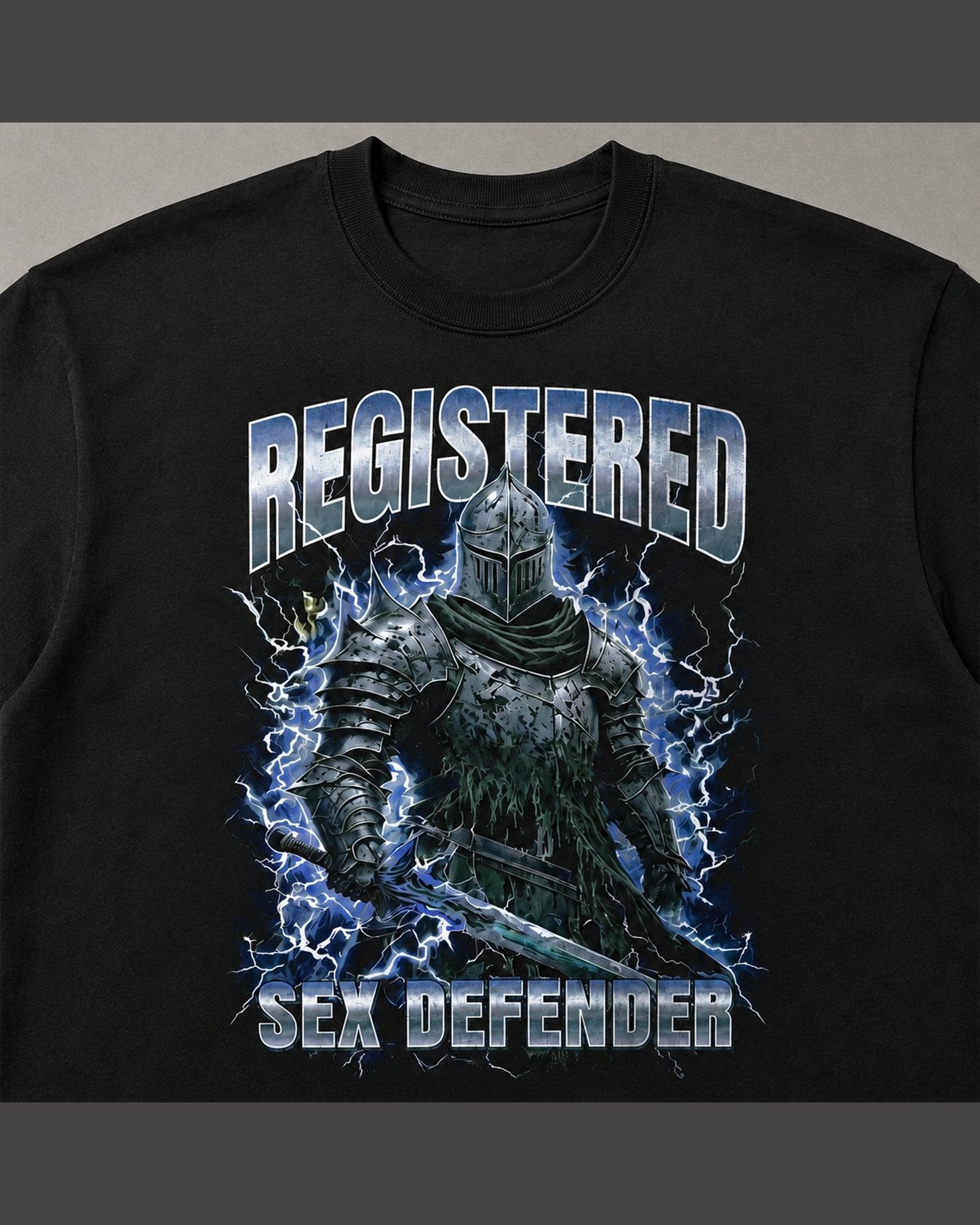 Close-up of the screen printed REGISTERED SEX DEFENDER graphic on heavyweight cotton